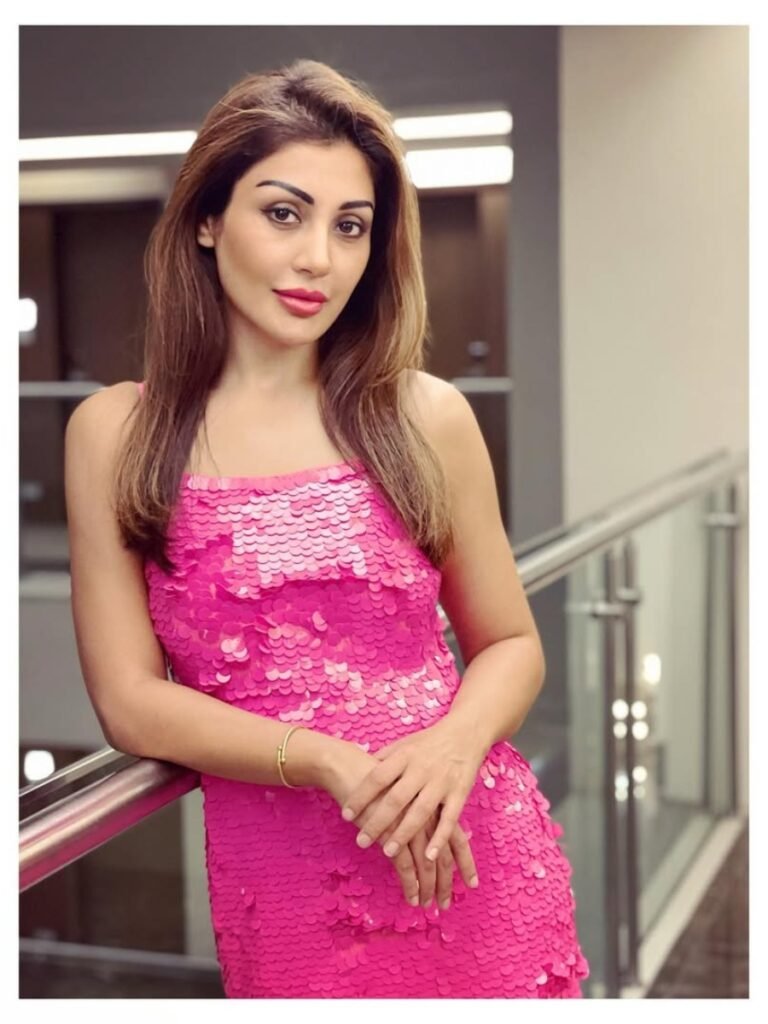 Who is Rimi Sen worked in Dhoom